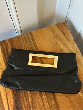 Michael Kors Black Leather Clutch with Gold Handle Cutout